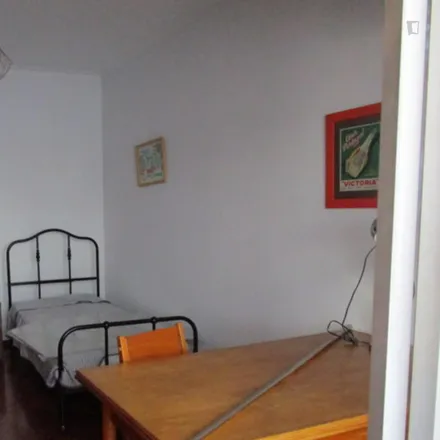 Rent this 3 bed room on Rua Francisco Baía in 1500-581 Lisbon, Portugal