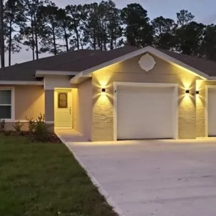Rent this 3 bed house on 194 Wellwood Lane in Palm Coast, FL 32164
