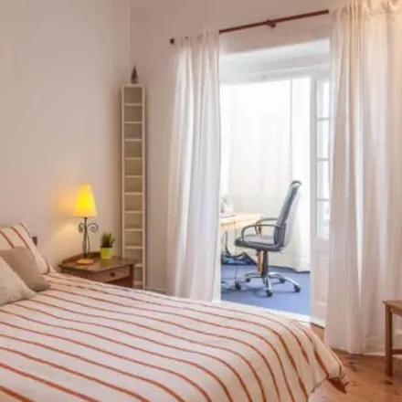Rent this 4 bed room on Mourense in Calçada de Palma de Baixo, 1600-177 Lisbon