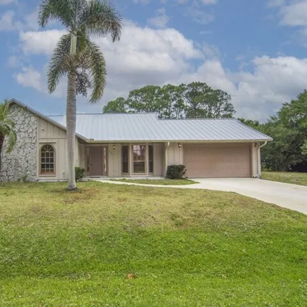 Buy this 3 bed house on Island Pines Golf Club in 5700 Indian Pines Boulevard, Fort Pierce