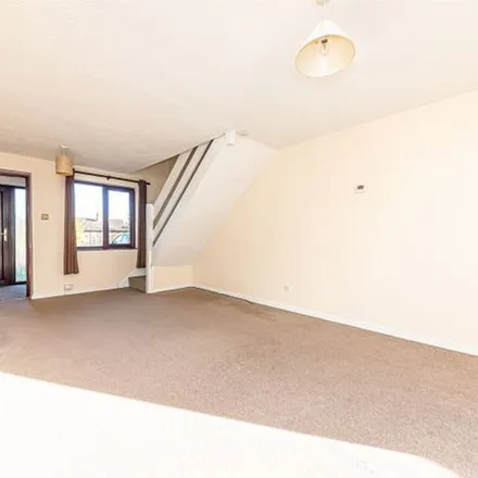 Rent this 3 bed townhouse on 21 Ramsbury Drive in Reading, RG6 7RS