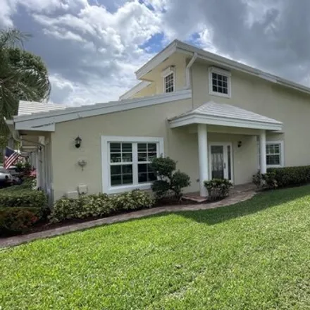 Rent this 3 bed house on 228 Canterbury Drive West in Palm Beach Gardens, FL 33418
