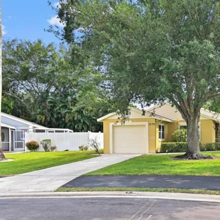 Buy this 2 bed house on 1281 Slash Pine Circle in West Palm Beach, FL 33409