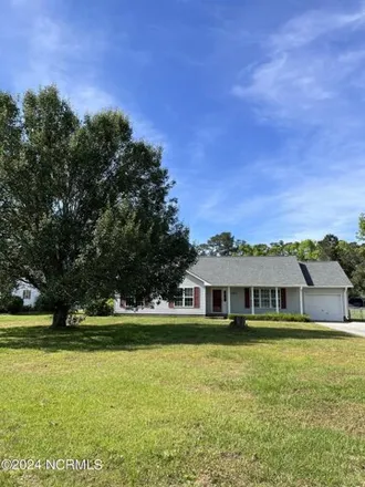 Rent this 3 bed house on 1693 Champion Drive in Sunrise Point, Carteret County