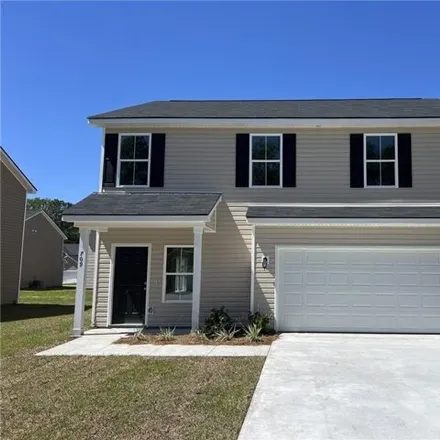 Buy this 4 bed house on 729 Mill Creek Circle in Mill Creek, Hinesville