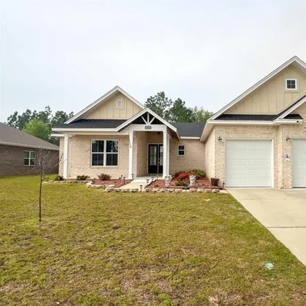 Rent this 4 bed house on 7984 Bald Cypress Drive in Santa Rosa County, FL 32583