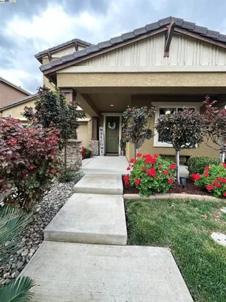 Rent this 4 bed house on 739 Questa Court in Mountain House, CA 95391