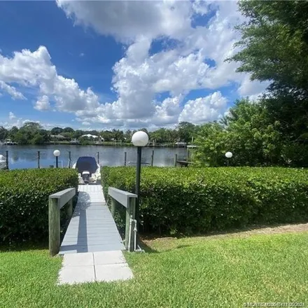 Rent this 2 bed condo on 986 Northwest Spruce Ridge Drive in North River Shores, Martin County