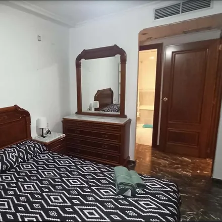 Rent this 4 bed room on Carrer de Fontanars dels Alforins in 24, 46007 Valencia