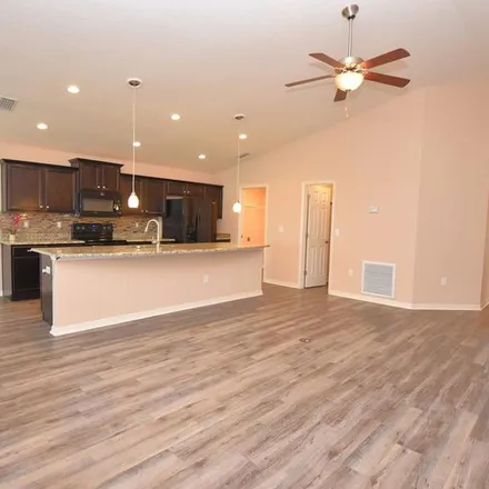 Rent this 4 bed apartment on 5325 White Egret Lane in Lakeland, FL 33811