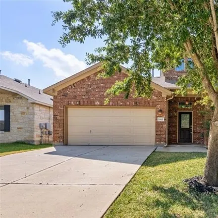 Rent this 4 bed house on 18617 Dry Pond Drive in Travis County, TX 78660
