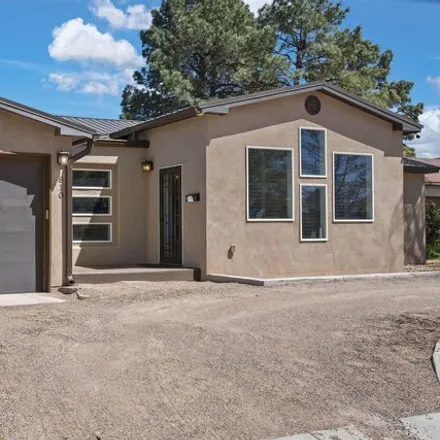 Buy this 4 bed house on Carlisle Boulevard Southeast in Albuquerque, NM 87106