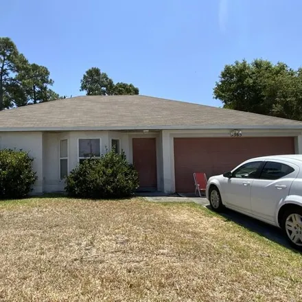 Rent this 3 bed house on 3391 Southwest Mundy Street in Port Saint Lucie, FL 34953