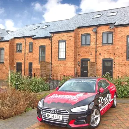 Rent this 3 bed townhouse on Co-op Food in 71 High Street, Milton Keynes