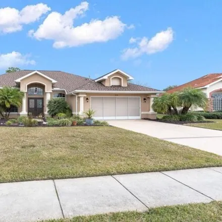 Buy this 3 bed house on 14291 Cascora Court in Spring Hill, FL 34609