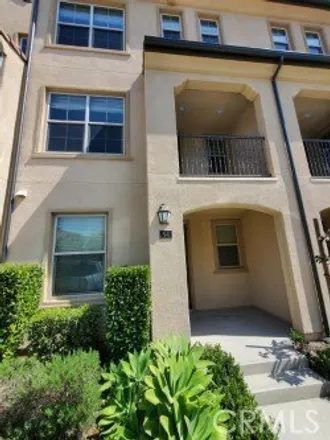 Rent this 4 bed condo on 50-56 Capricorn in Irvine, CA 92618