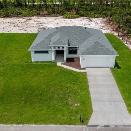 Buy this 3 bed house on 1437 8th Avenue in Lehigh Acres, FL 33972