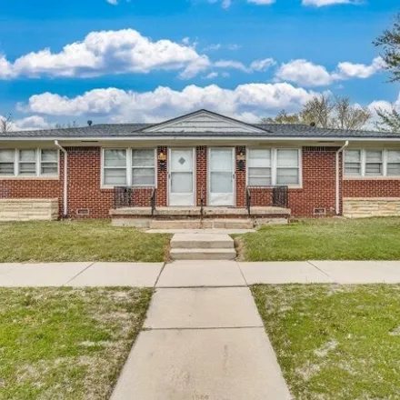 Buy this 4 bed house on JumpStart in 895 East Lincoln Street, Wichita