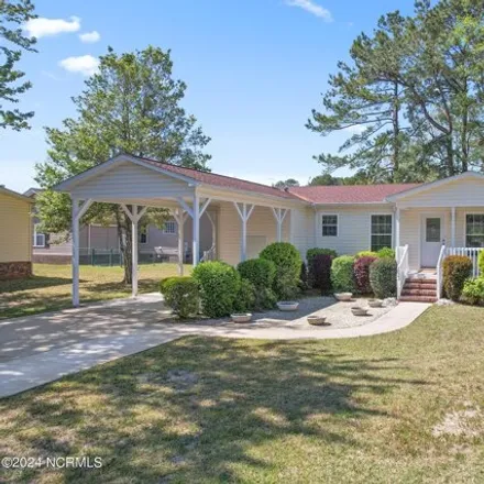 Buy this studio apartment on 1045 Palm Court Southwest in Carolina Shores, Brunswick County