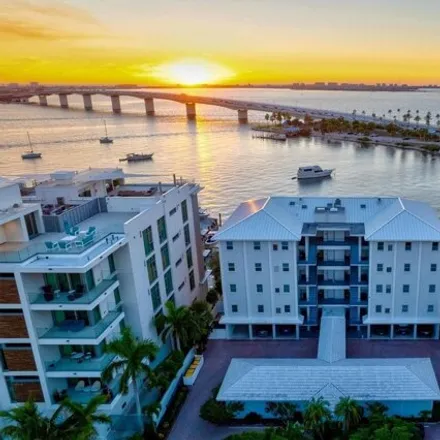 Buy this 2 bed condo on Golden Bay in 166 Golden Gate Point, Sarasota
