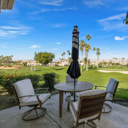 Buy this 2 bed condo on Palm Royale Country Club in Emerald Drive, La Quinta