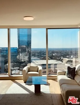 Rent this 2 bed condo on Metropolis Residential Tower I in Harbor Freeway, Los Angeles