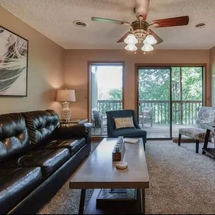 Rent this 4 bed condo on Reeds Spring