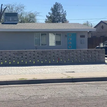 Rent this 4 bed house on 2229 East Virginia Avenue in Phoenix, AZ 85006