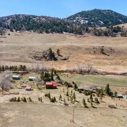 Buy this 2 bed house on County Road 82E in Larimer County, CO