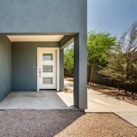 Rent this 3 bed house on 1818 W Earll Dr Unit 10 in Phoenix, Arizona