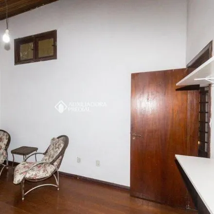 Rent this 3 bed house on Avenida América in Auxiliadora, Porto Alegre - RS