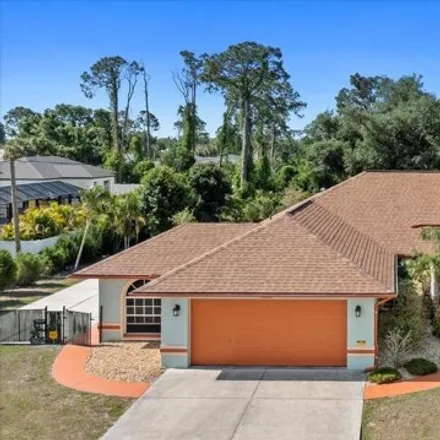 Buy this 3 bed house on 1420 Torino Street in North Port, FL 34287