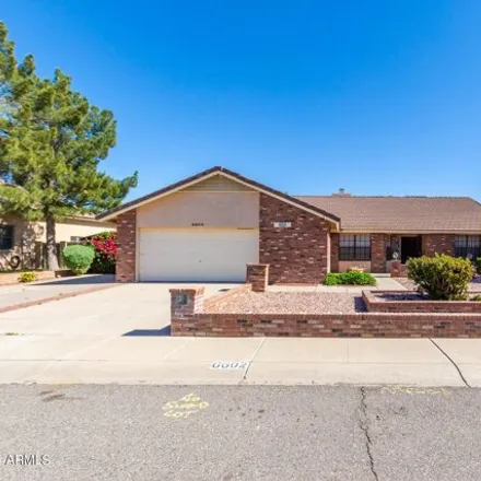 Buy this 4 bed house on 6602 West Gelding Drive in Glendale, AZ 85306
