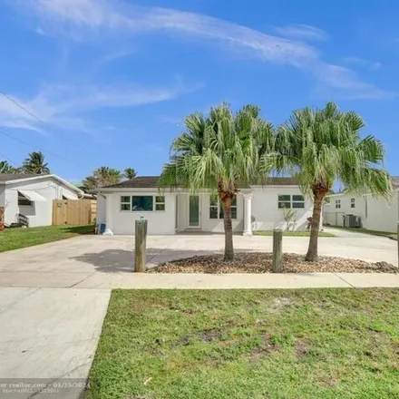 Rent this 4 bed house on 4548 Southwest 34th Drive in Dania Beach, FL 33312