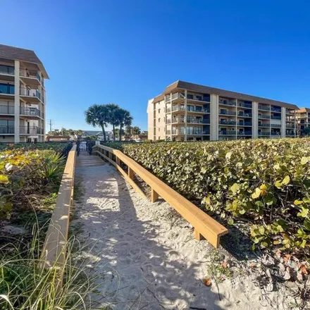 Buy this 2 bed condo on 8400 Ridgewood Avenue in Cape Canaveral, FL 32920