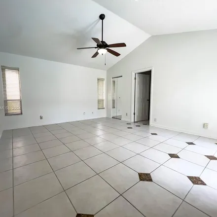 Rent this 3 bed apartment on 9927 Majestic Way in Sun Valley, Palm Beach County