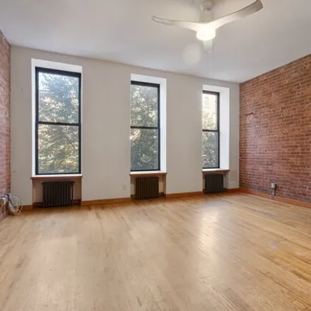 Rent this 2 bed house on 102 West 130th Street in New York, NY 10027