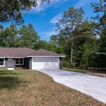 Buy this 3 bed house on 6435 Sw 204th Ave in Dunnellon, Florida