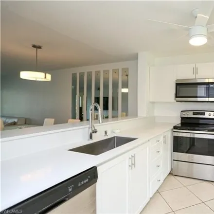 Rent this 2 bed condo on 5750 Deauville Circle in Lely Country Club, Collier County