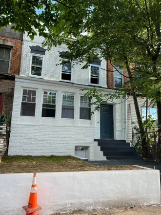 Buy this 4 bed townhouse on 721 Saratoga Avenue in New York, NY 11212