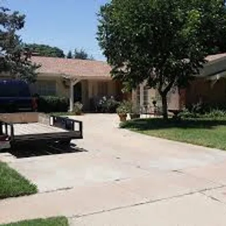 Rent this 3 bed house on 6110 Kenosha Drive