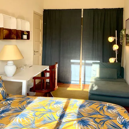 Rent this 4 bed room on Rua Carlos Mardel 22 in 1000-098 Lisbon, Portugal