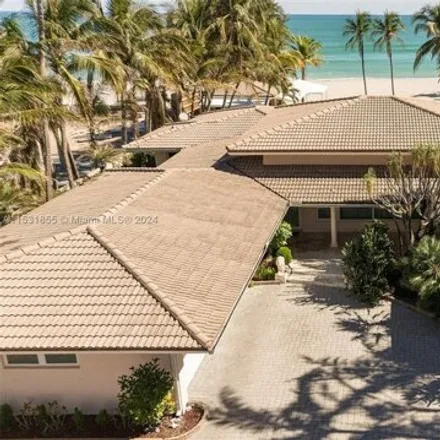 Rent this 4 bed house on 205 Ocean Boulevard in Golden Beach, Sunny Isles Beach