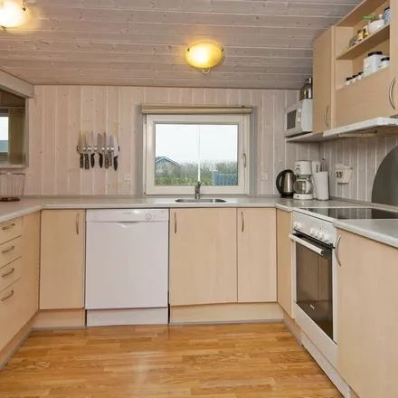 Rent this 4 bed house on Hemmet Strand in 6893 Hemmet, Denmark