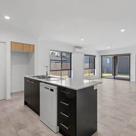 Rent this 4 bed apartment on Teal Circuit in Greenbank QLD 4124, Australia