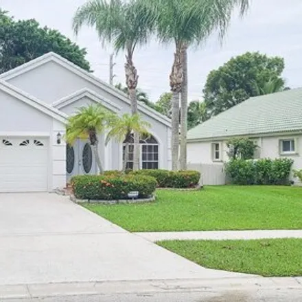 Rent this 3 bed house on 1851 Oak Berry Cir in Wellington, Florida
