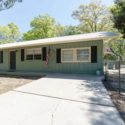 Buy this 3 bed house on 406 North 1st Street in DeFuniak Springs, FL 32433