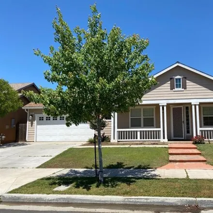 Rent this 4 bed house on 616 Cambridge Drive in Reedley, CA 93654