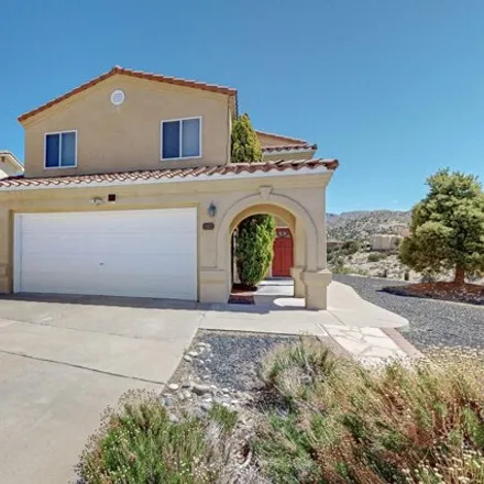 Buy this 3 bed house on 498 Poinsettia Place Southeast in Winterwood Park (HOA), Albuquerque