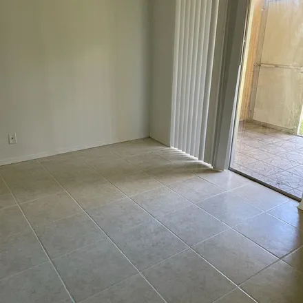 Rent this 1 bed apartment on 500 Village Green Circle West in Palm Springs, FL 33461